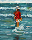 little girl enjoying the waves